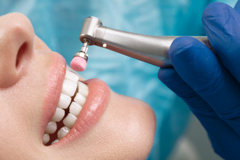 A dental hygienist at a modern dental clinic.