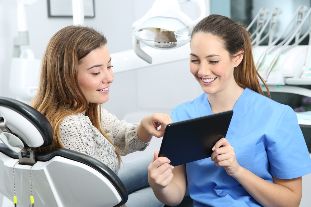 a dental nurse taking care of patients.